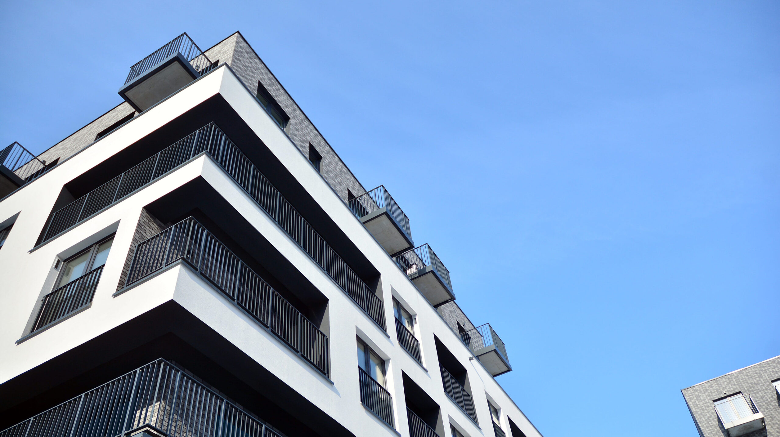 modern apartment building in sunny day. exterior, residential house facade.